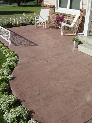 This patio is stamped with the Ashlar Slate stamp.